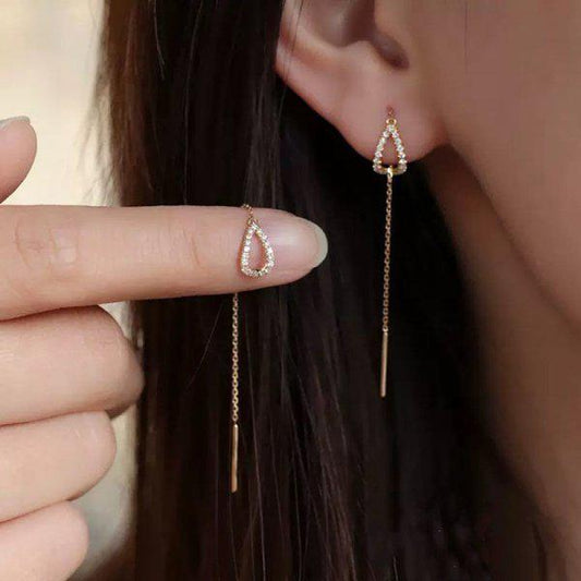 Hollow Brilliant Water Drop Pendant Earrings in Gold